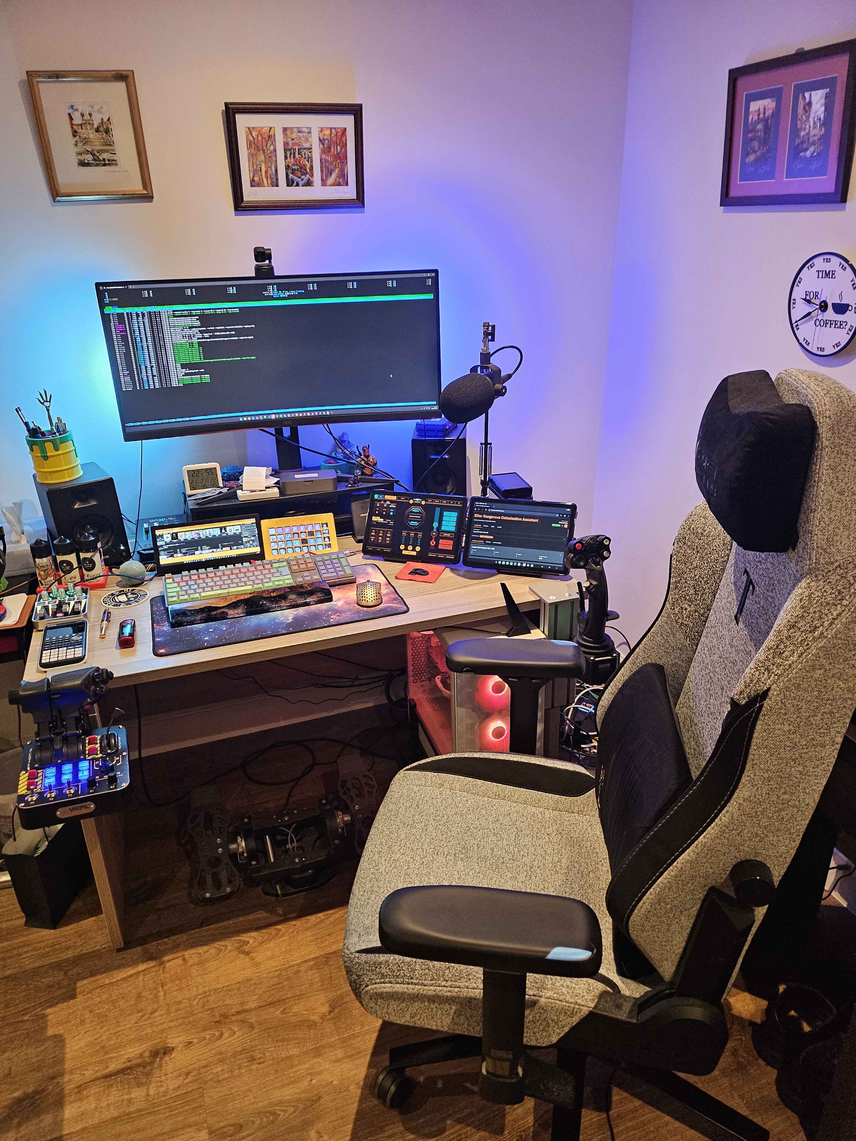 Command battlestation photo 1: desk setup with large monitor, laptops and control decks